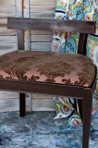how to redo or makeover a wood vanity stool with spray paint and new fabric
