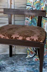 how to redo or makeover a wood vanity stool with spray paint and new fabric