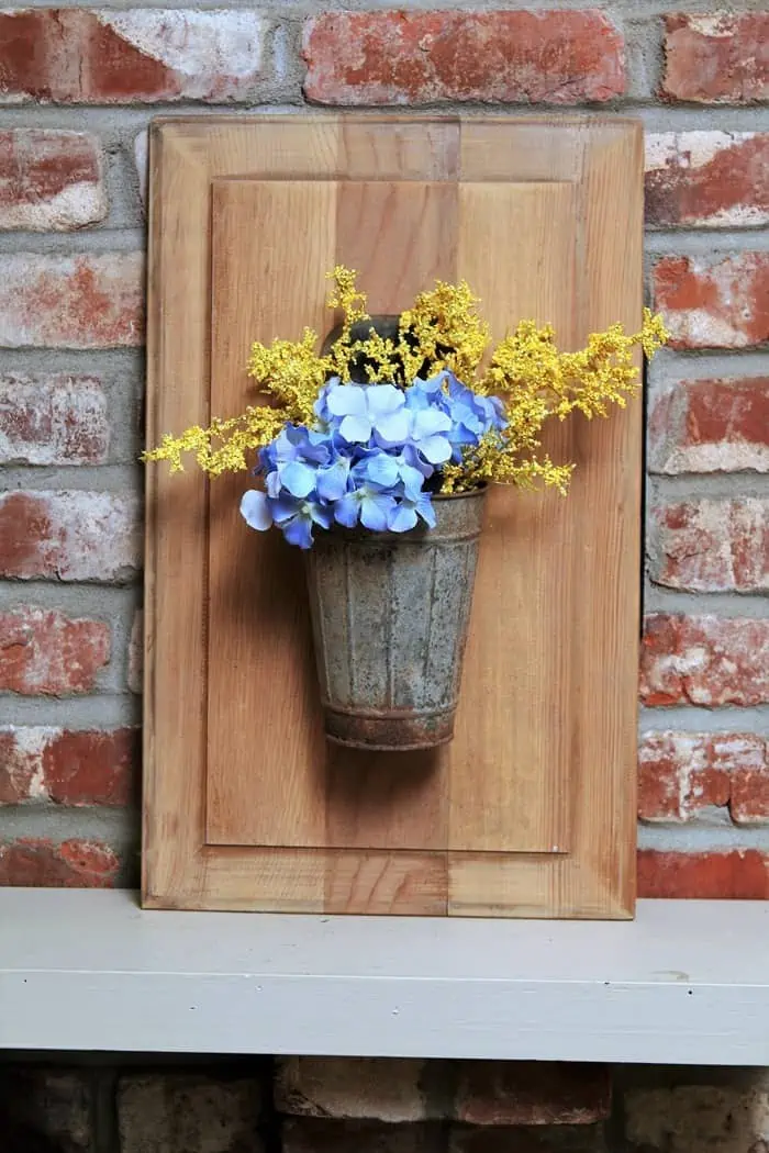 bucket of flowers on a cabinet door diy diplay idea (4)