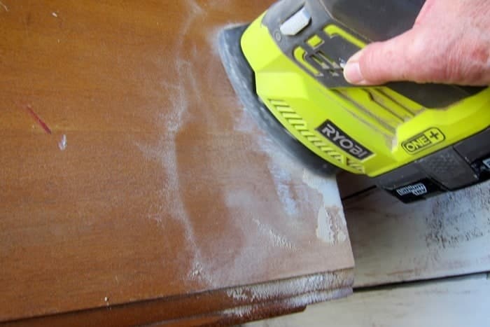 fill missing veneer with putty and sand
