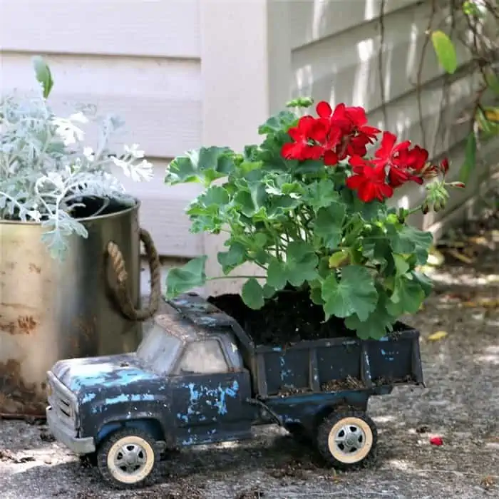 use an old metal toy truck as a flower pot