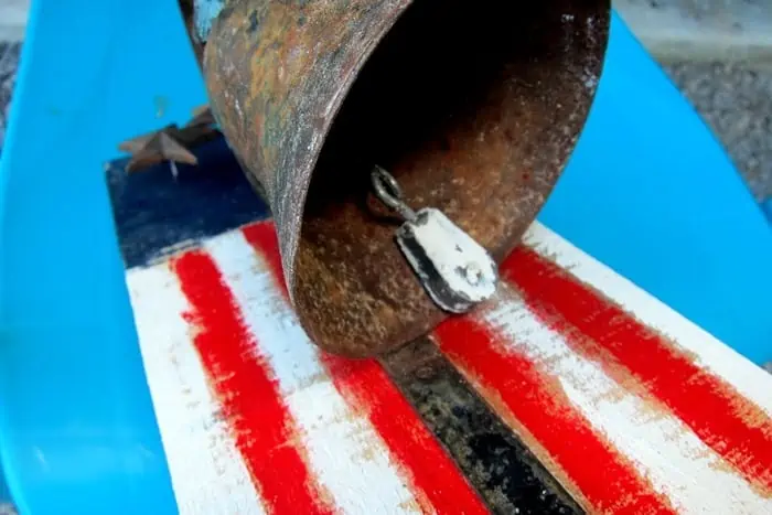 how to replace the dinger in an iron bell