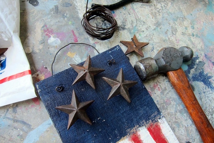 nail head stars on a wood flag