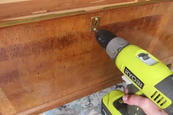 replace the lock on a cedar chest with a brass keyhole piece