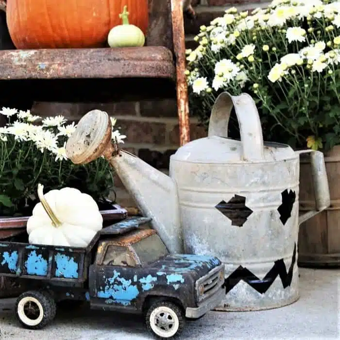 decorating for Fall with vintage items and toy trucks 