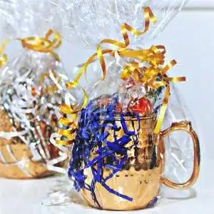 Moscow Mule filled with Candy and wrapped in Cellophane makes a great Holiday Hostess Gift
