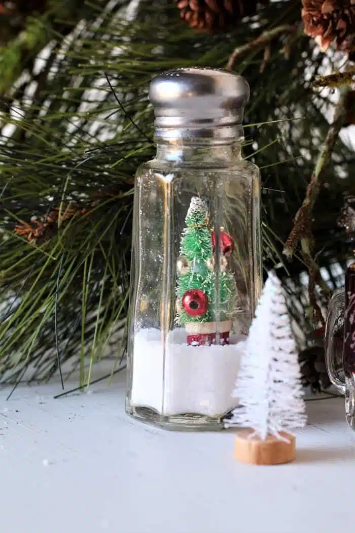 how to put a small Christmas tree in a salt shaker snow scene 