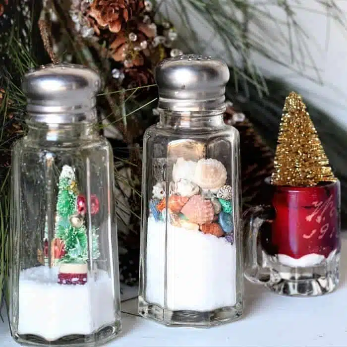 miniature Christmas trees in glass containers