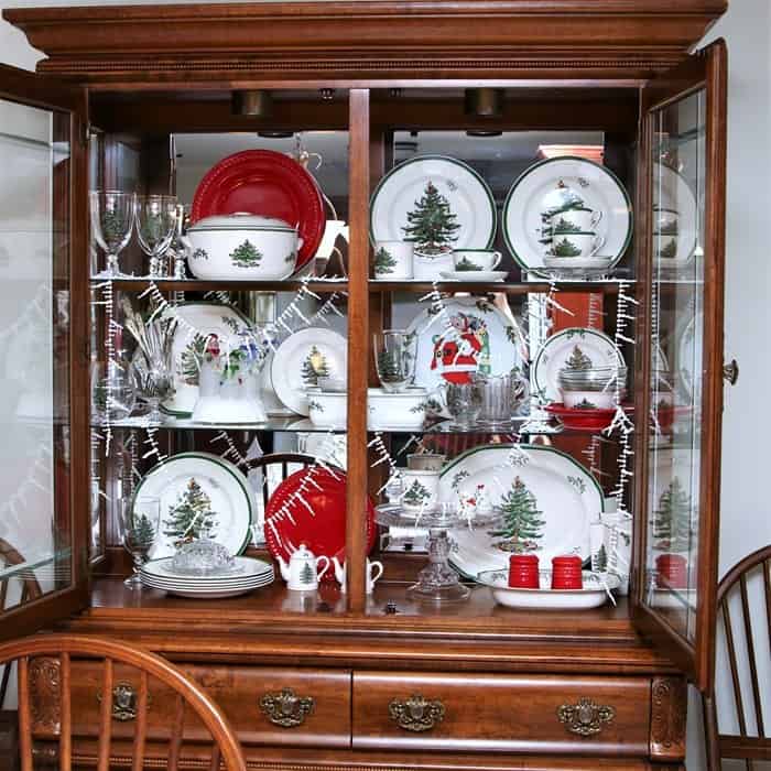 Christmas dishes displayed in China Cabinet