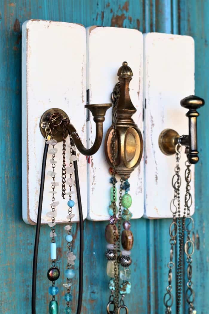 make use of old drawer pulls and hardware by recycling into home decor