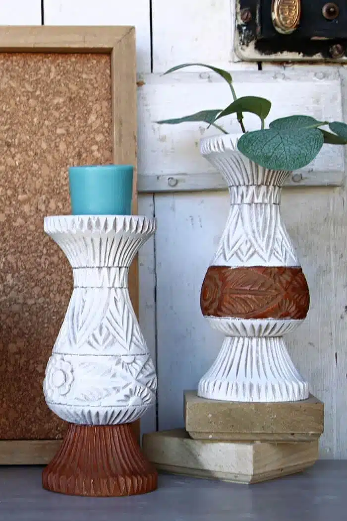 spray paint monkey pod wood vases with white spray piant and leave some of the original stained wood as is.