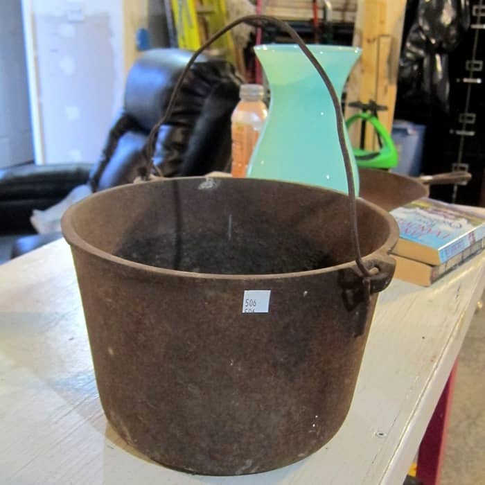 you can buy old iron bean pots at an auction