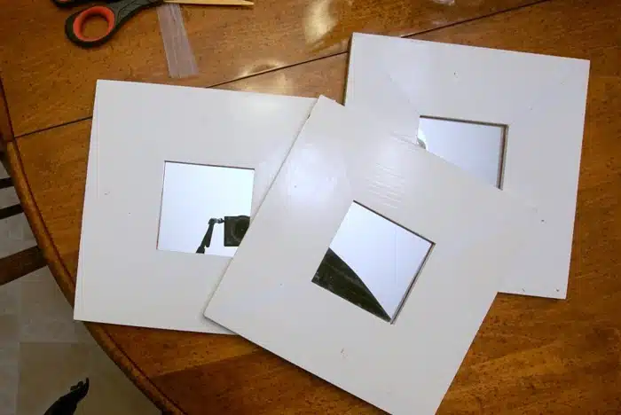 white framed mirrors form the flea market