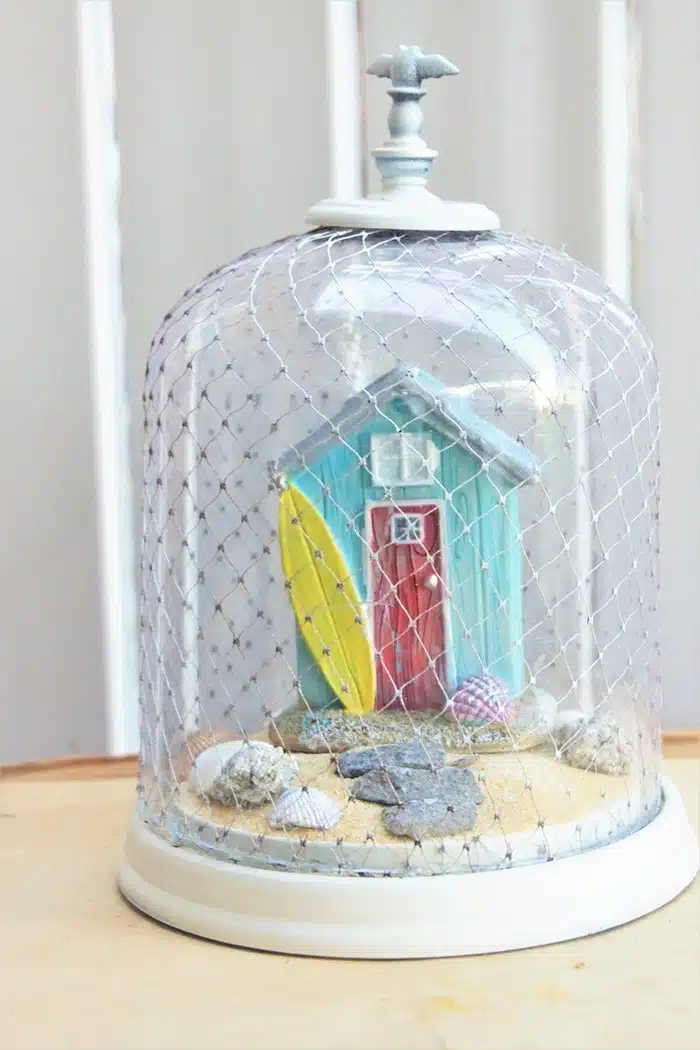 Coastal Style Cloche with net cover and beach shack (4)