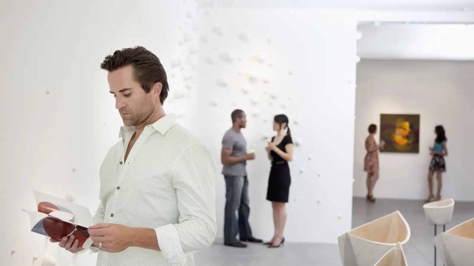 man in art gallery