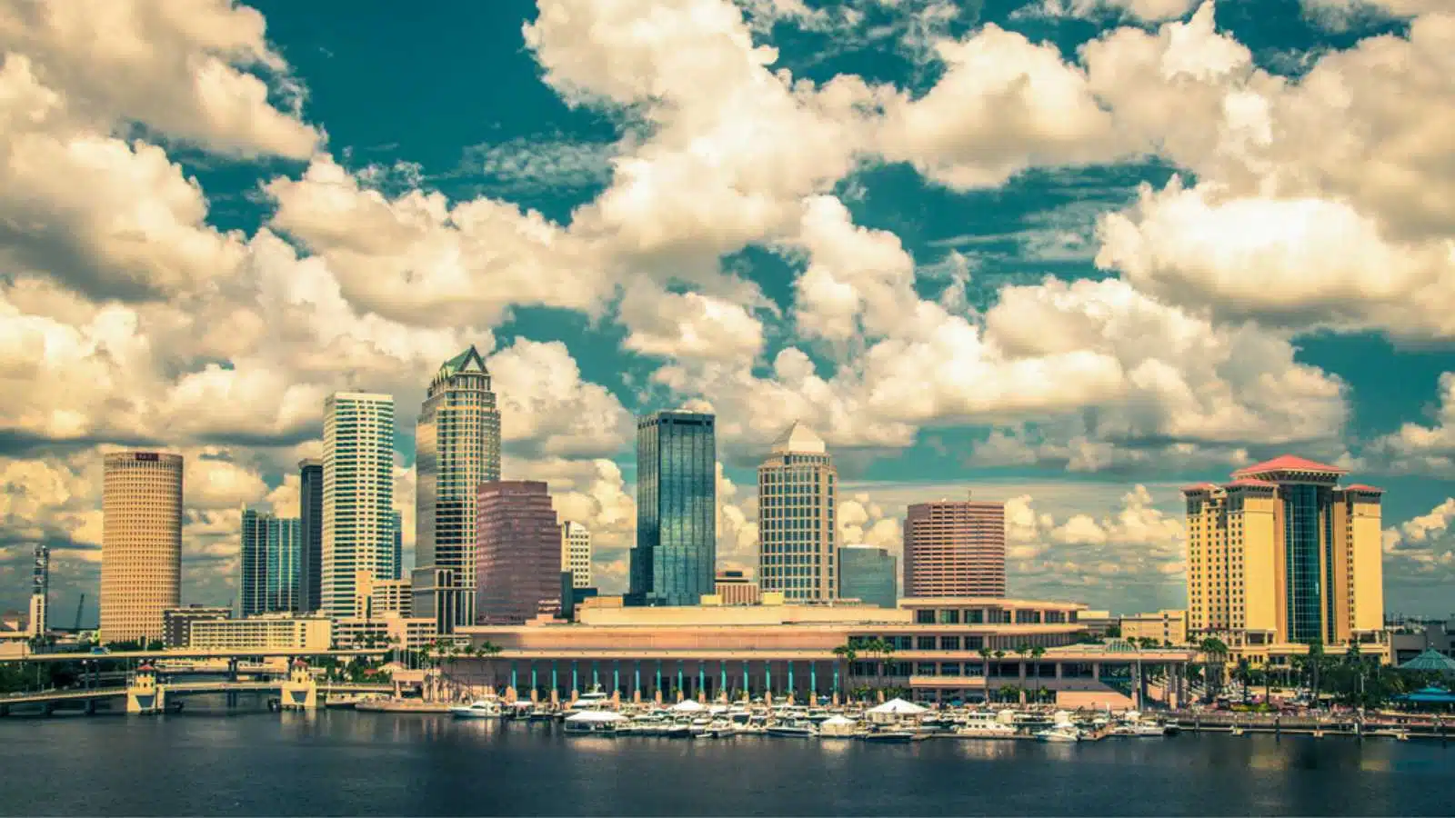 Vintage tone style image of Tampa Florida skyline under beautiful clouds