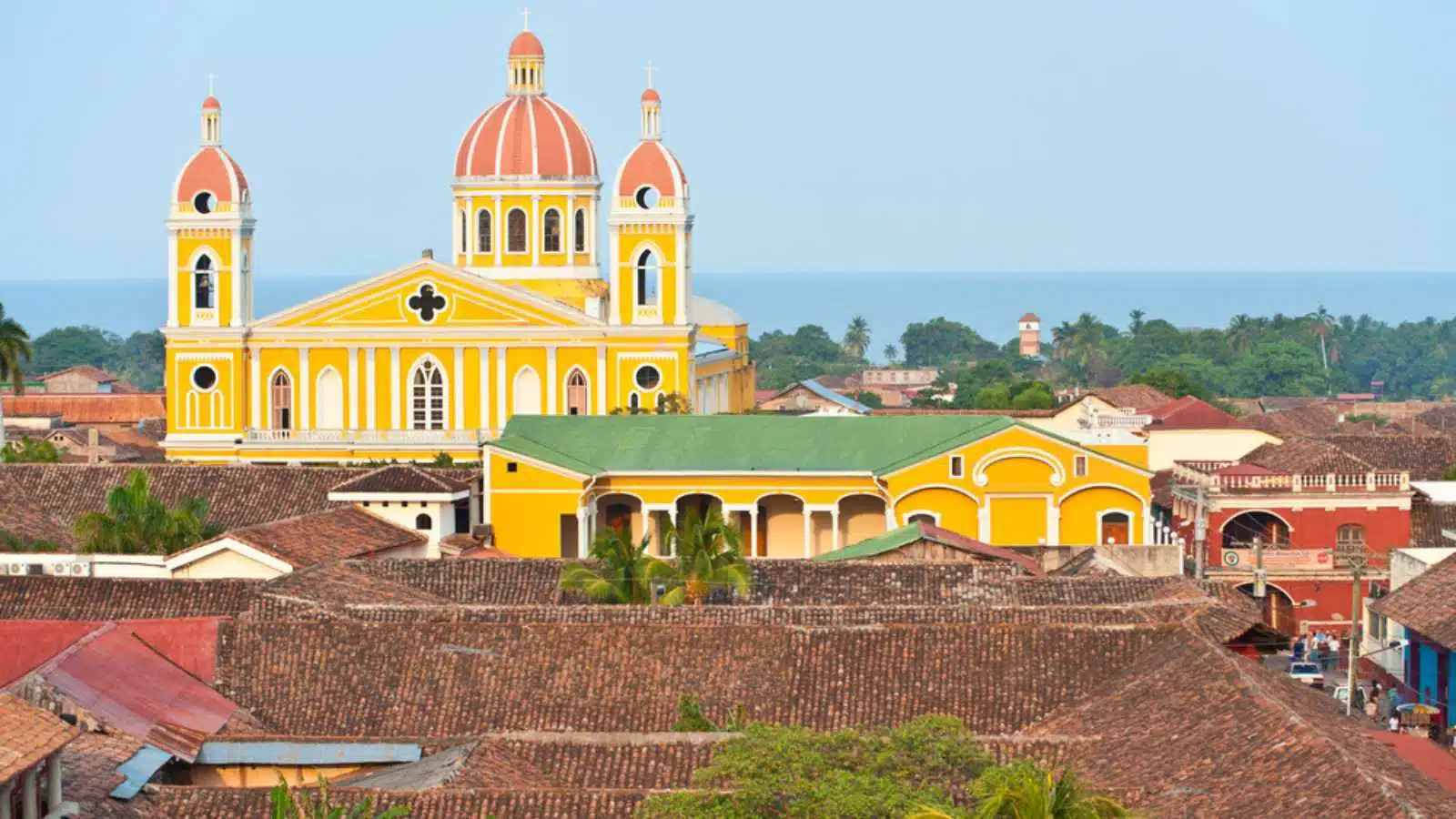 Granada cathedral and lake Nicaragua on the background, Nicaragua.