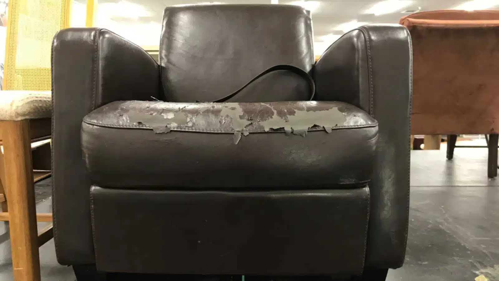 really beat up old leather chair