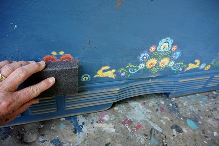 distress re design by prima transfers using a sanding block