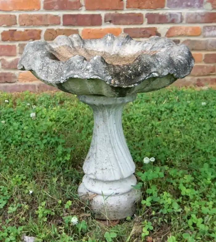 small concrete bird bath