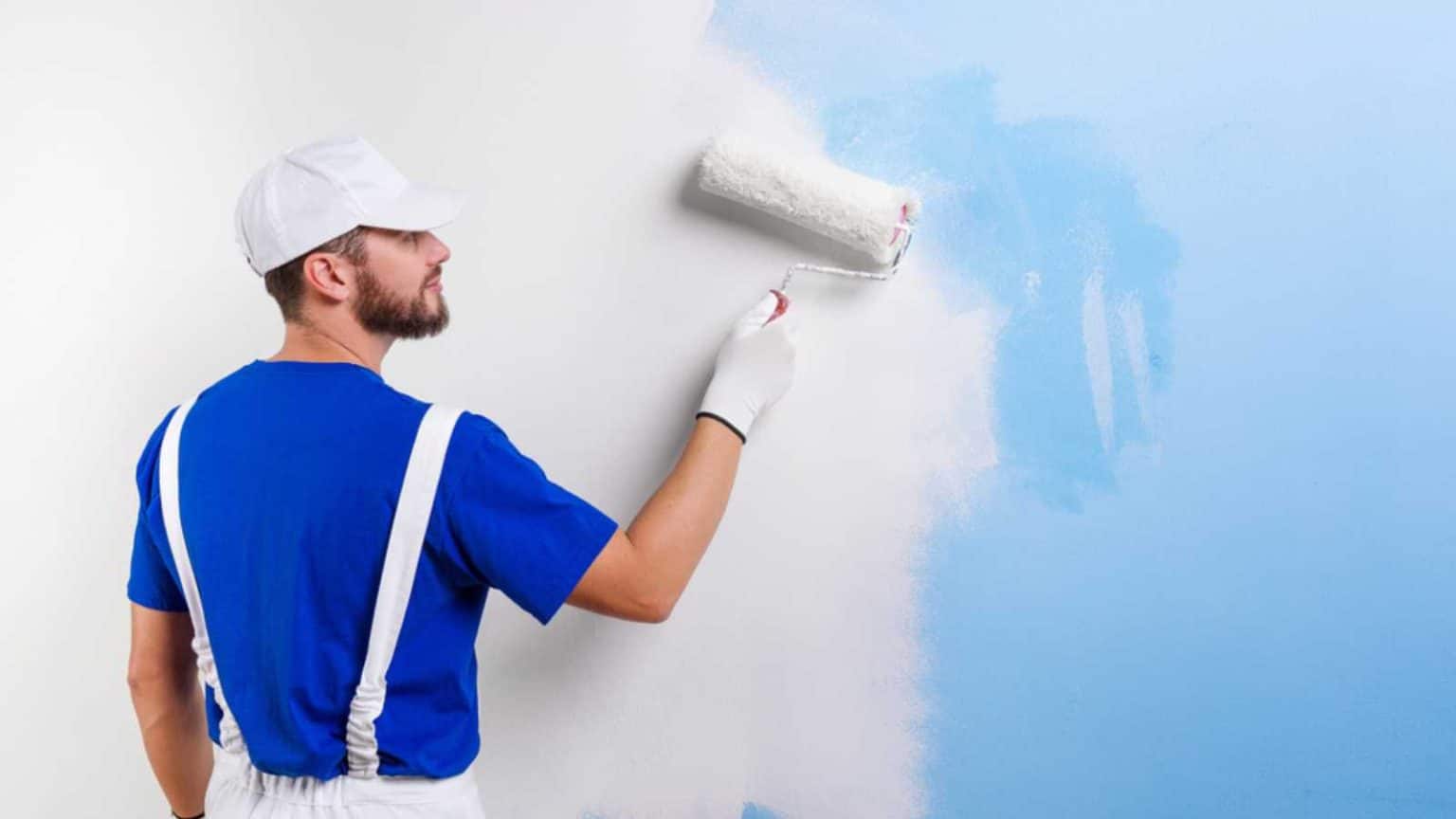Man painting wall