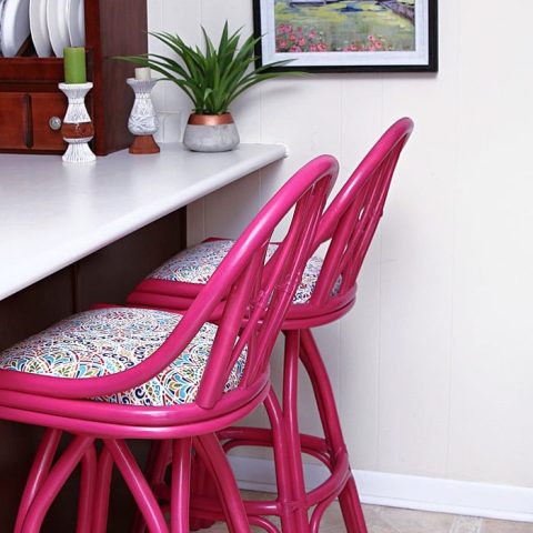 colorful hot pink painted bar stools.