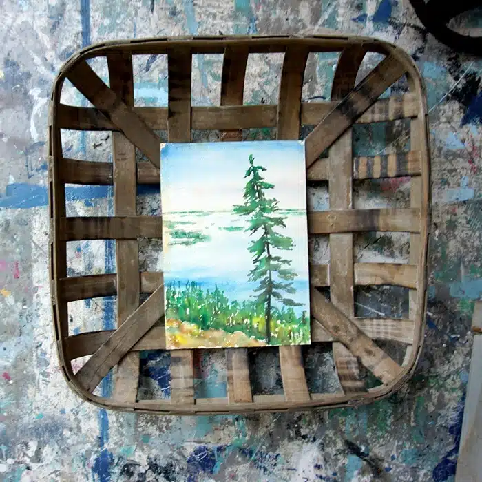 place an oil painting into the middle of a tobacco basket