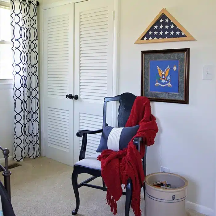 white bedroom with blue chair painted by Petticoat Junktion