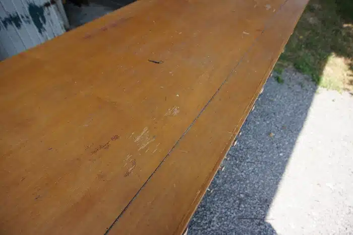 dresser top with scratches 