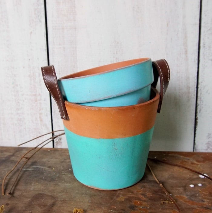 pair of painted clay pots for flowers