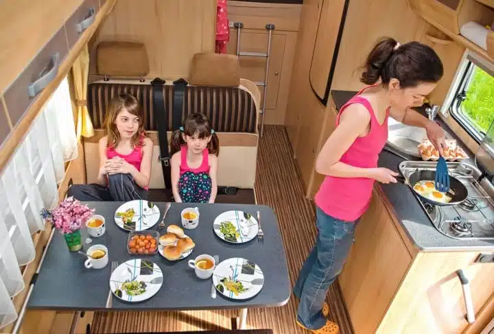 Recreational Vehicle Kitchen with family eating
