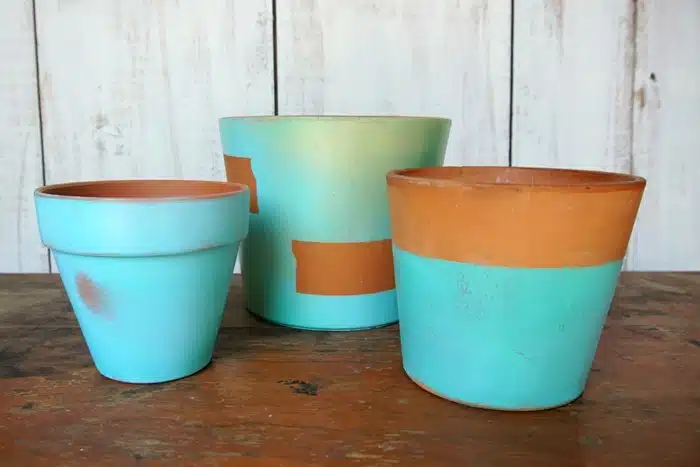 spray painted terracotta flower pots
