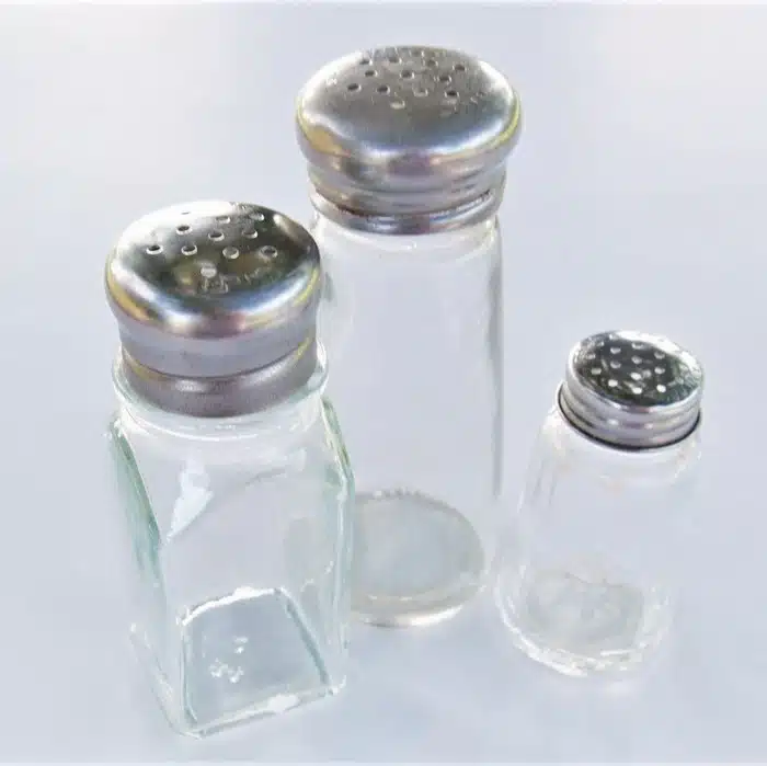 glass salt and pepper shakers (3)