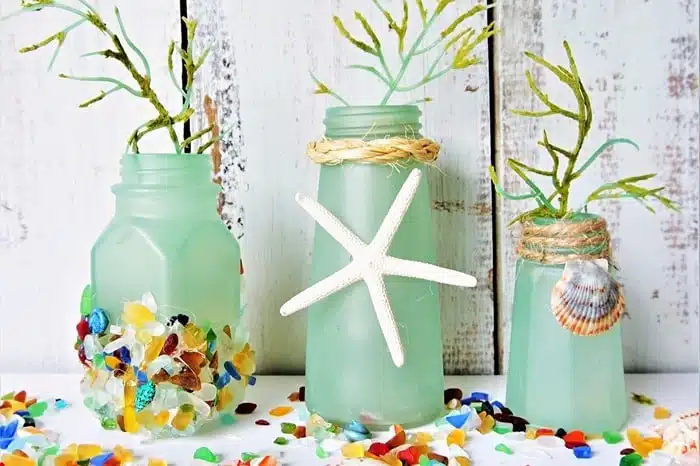 DIY sea glass decor created using salt shakers and spray paint