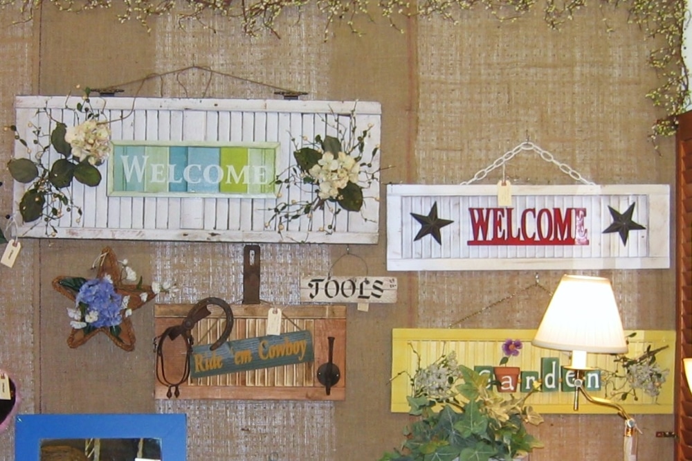 signs I made from old shutters when we lived in Florida