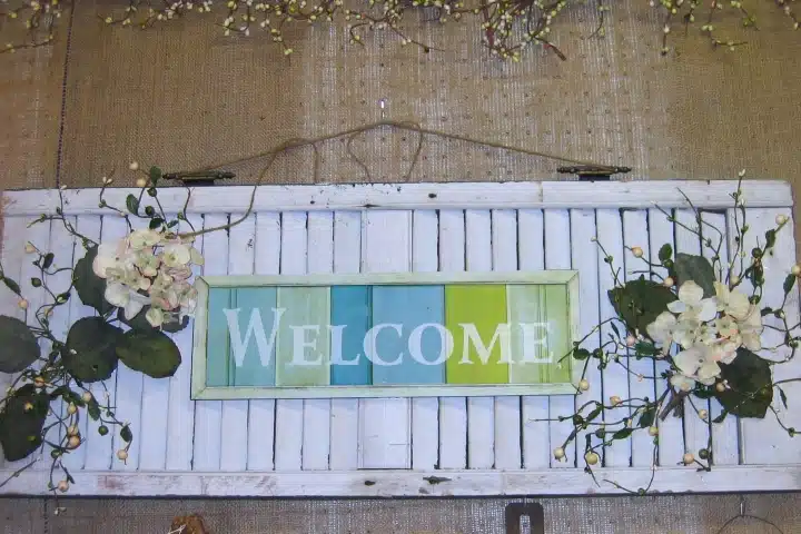 white Welcome shutter sign