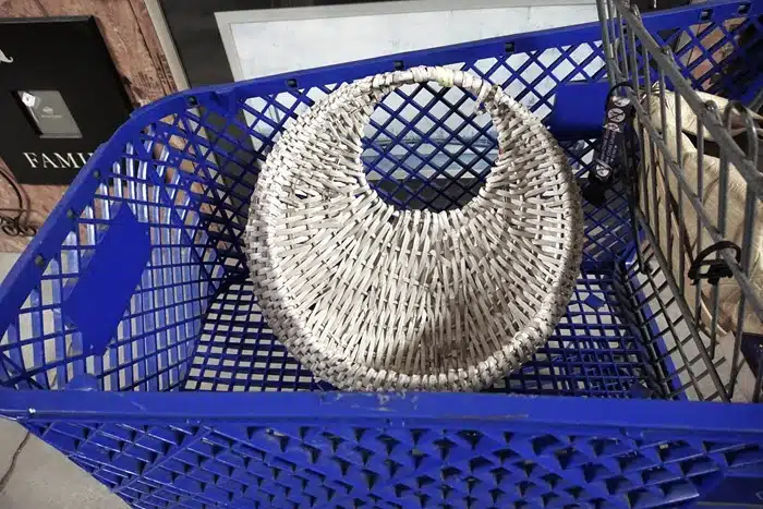white hanging basket bought at the flea market