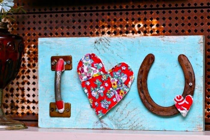 i love you sign made with reclaimed items