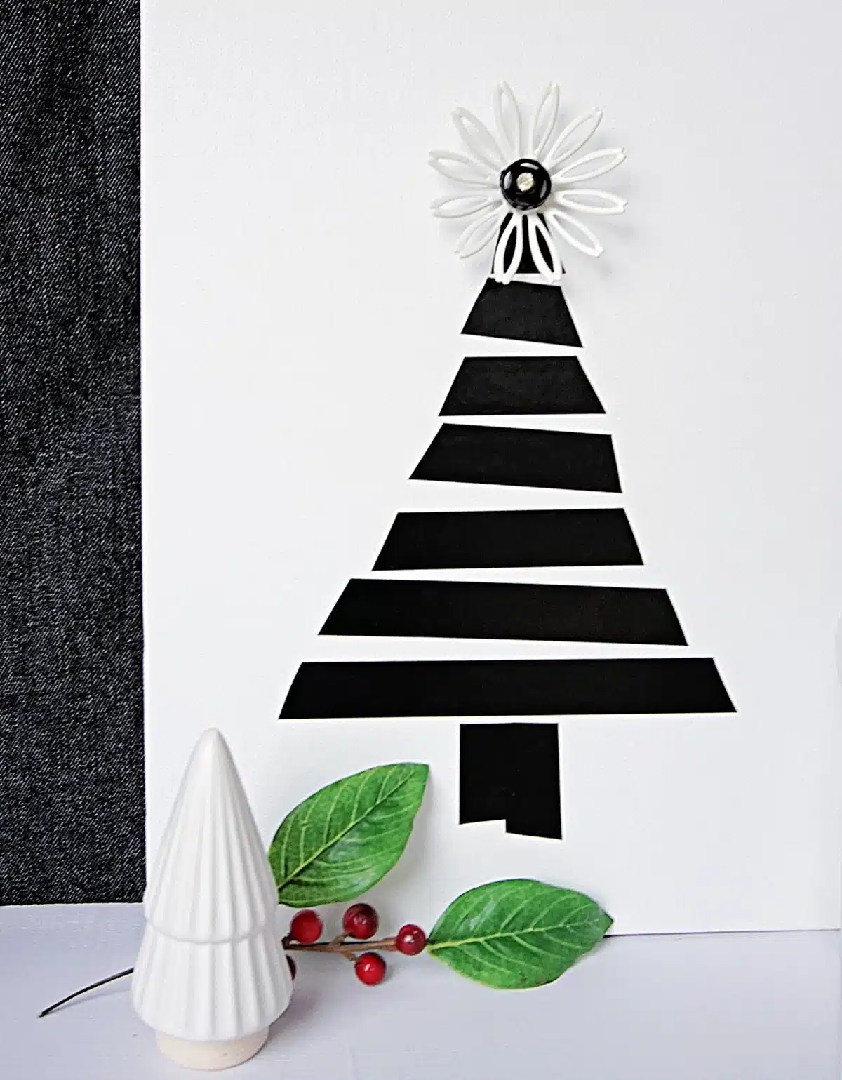 Christmas tree wall decor made with black electrical tape