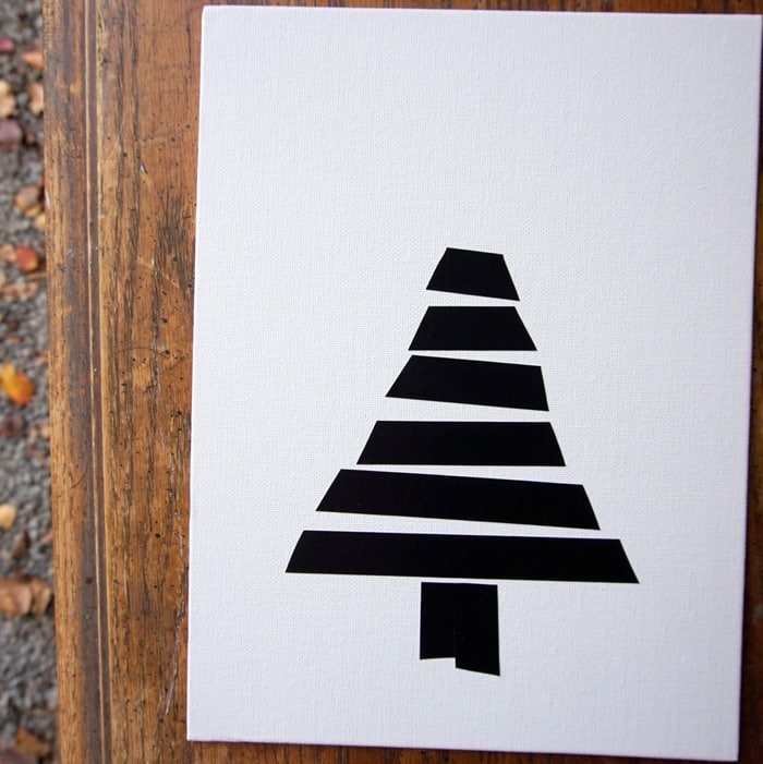 making Christmas tree wall decor using black electrical tape (8)