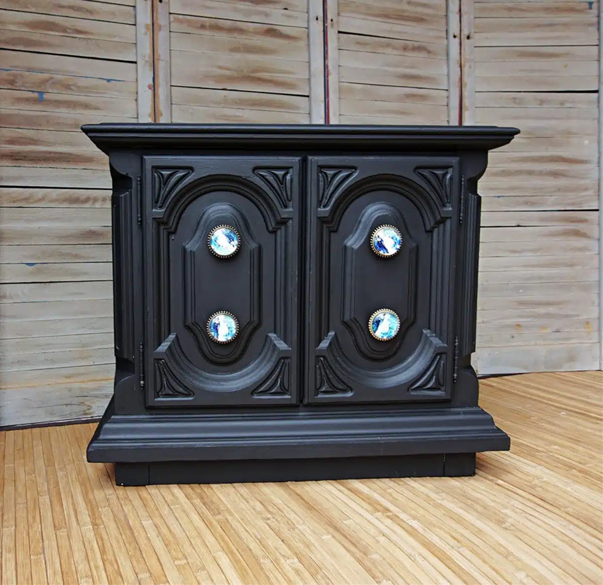 paint a table with black paint and add new knobs