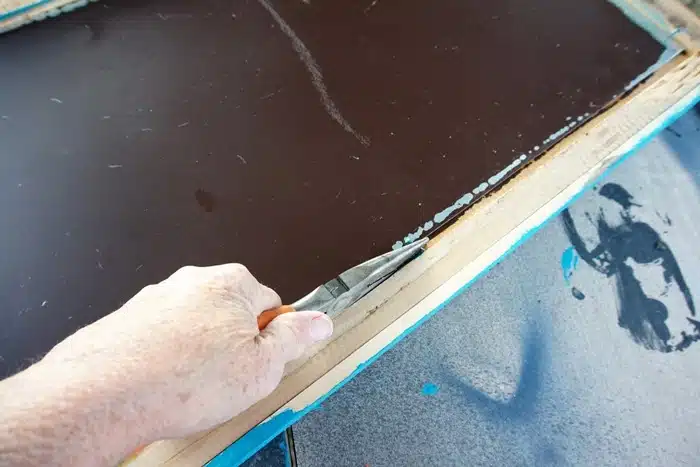 remove a board from a frame