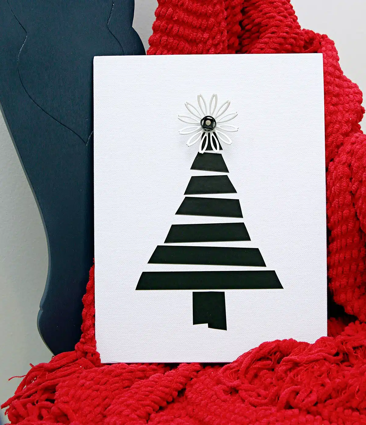 shocking Christmas tree wall decor made using black electrical tape 2