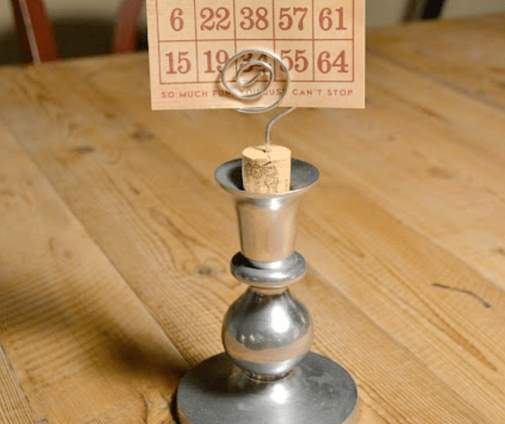 candlestick photo display by Homeroad made from a silver plate candlestick 
