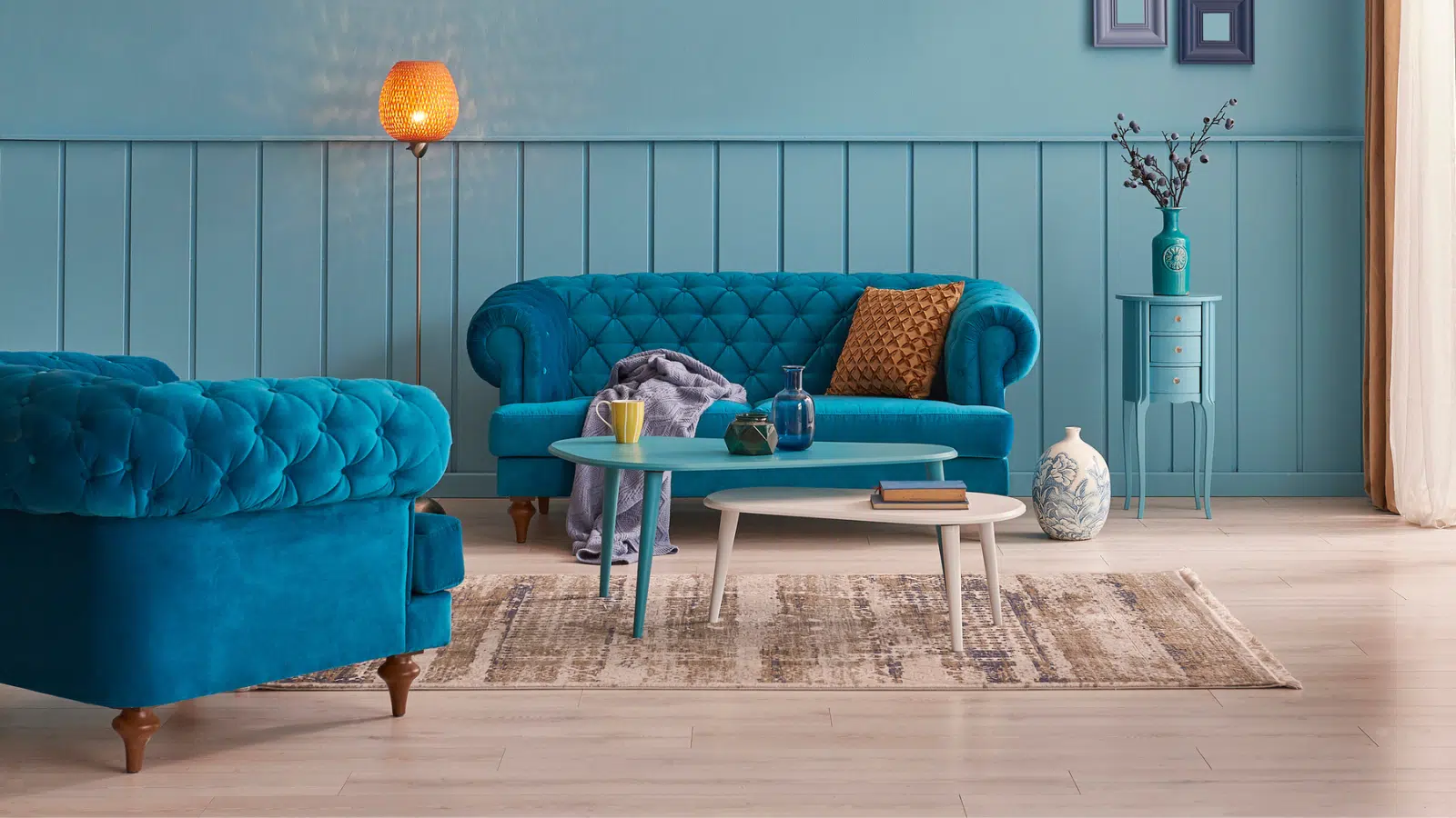 blue sofa and blue walls