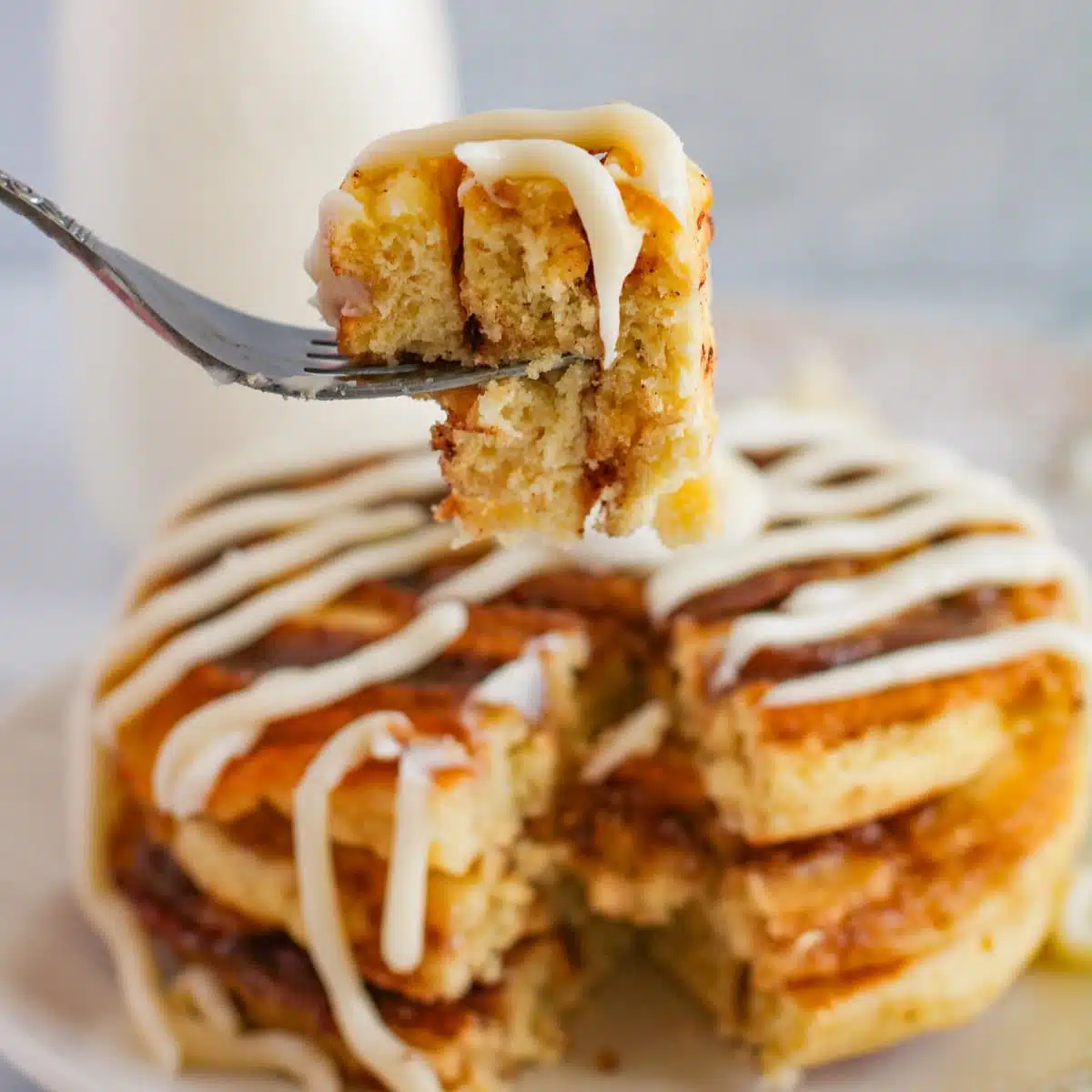 cinnamon roll pancakes with cream cheese icing