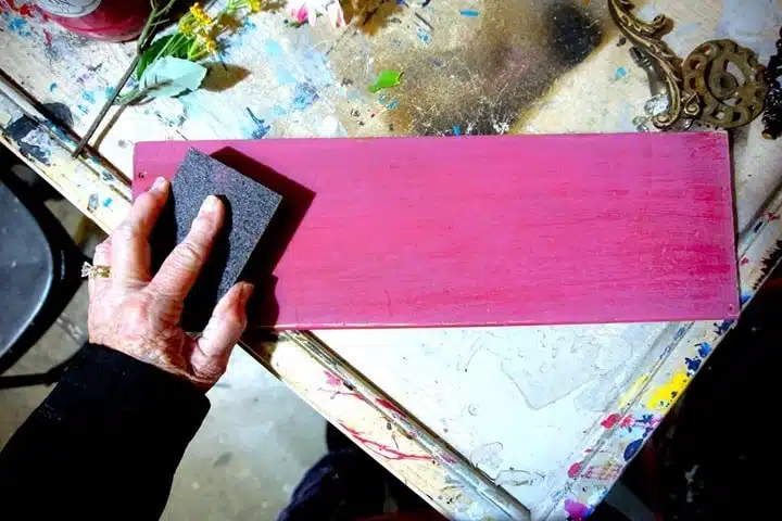 paint a piece of reclaimed wood pink or red and make a love sign