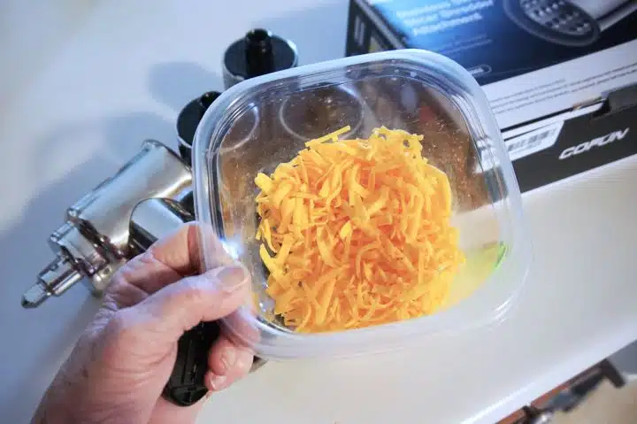 shred cheese with a Kitchenaid mixer attachment