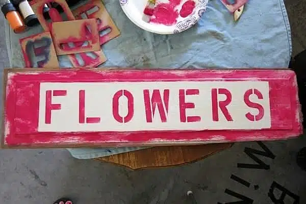 stenciled flowers sign