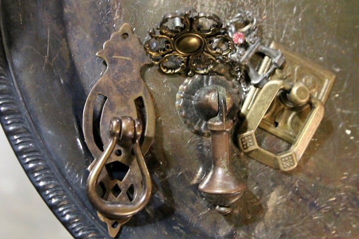 make magnets out of old hardware and drawer pulls